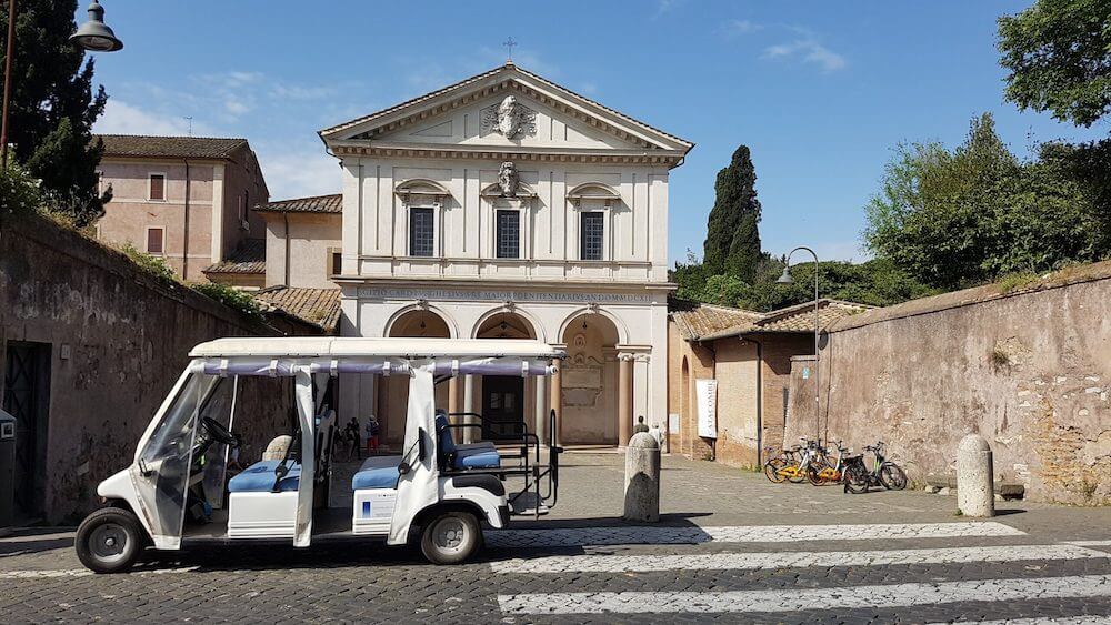 Golf Cart in front of the Church of Saint Sebastian